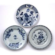 Three blue and white porcelain plates Chinese, 18th Century each with foliate designs, one with
