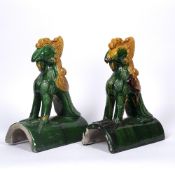 Pair of polychrome arched roof tiles Chinese, late 19th/early 20th Century each surmounted by