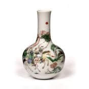 Small porcelain famille verte bottle vase Chinese, 19th Century painted in enamels with a hunting