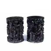 Pair of relief carved brush pots Chinese, 19th Century in black stained hardwood, 20.5cm high
