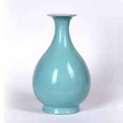 Pear shaped vase Chinese, 20th Century with a turquoise glaze and a flared base, Qianlong underglaze