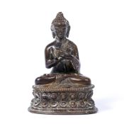 Bronze figure of the Buddha Shakyamuni Sino-Tibetan, 18th/early 19th Century seated in dhayanasana