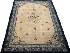 Peking carpet Chinese, circa 1920 ivory ground with stylised blue foliate motifs, 340cm x 270 cm