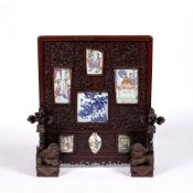Table screen with inset panels Chinese, 19th Century with central square blue and white porcelain
