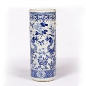 Blue and white porcelain stick stand Chinese, 19th Century painted with a dragon and peonies, within