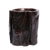Hardwood brush pot Chinese, Qing dynasty having naturalistic bark sides, 14.5cm high