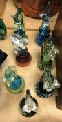 A collection of seven Mdina and Mdina style seahorse paperweights, some signed, ranging from 17.