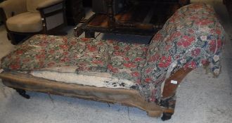 A Victorian day bed (for upholstery) with scroll end,