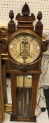 A carved oak cased 