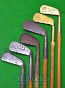 6x Assorted Junior Golf Clubs including a mashie and iron, a lofter, a brass headed iron, and a