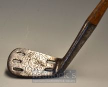 Rare Unnamed Water Iron with five slots to the face, having decorative ball shaped flower pattern