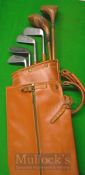 6x Golf Clubs in a faux leather bag to include 2x Josh Taylor large head woods, a driver and spoon