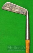 The Cupid Straight Blade Putter showing the Winton mark and stamped TH Lyle with oval hosel and