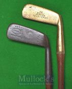 The Boodie Straight Blade Brass Head Putter with a short stout hosel fitted with a greenheart