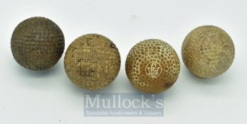 2x Unnamed Guttie Golf Balls in good round condition together with 2x Bramble pattern rubber cord