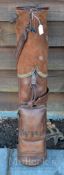 Good period leather pencil shaped golf bag – c/w leather shoulder strap, travel hood, and ball