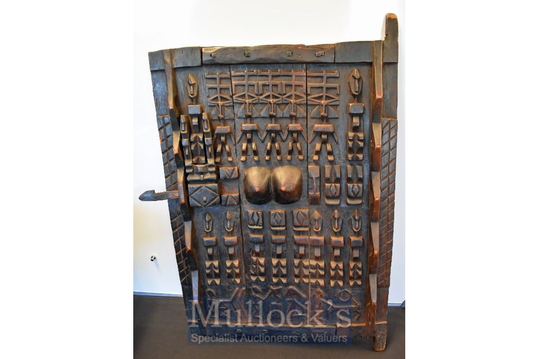 African Carved Wood Granary Door – Highly decorated with stylised figures still retaining the catch