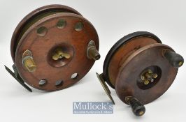 Large 7” Scarborough star back wood and brass big game reel with twin handles^ perforations^ appears