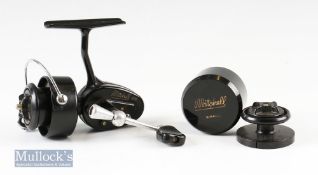 Mitchell 308 spinning reel and spare spool marked 107882 runs smooth in good clean condition overall