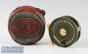 Orvis C F O IV 3 1/8” trout fly reel with green finish perforated body^ smooth foot^ U shape line