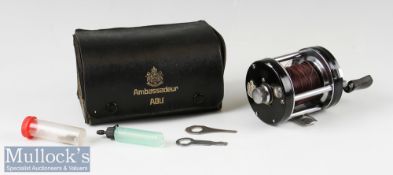 ABU Ambassadeur 6000C multiplying reel with black end plates^ foot stamped 760104 with leaflet^ tool