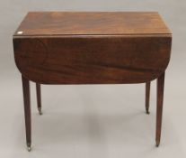 A 19th century mahogany Pembroke table. 82 cm long.