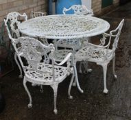 A modern white painted patio set.