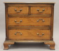 A modern George III style mahogany chest of drawers. 80 cm wide.