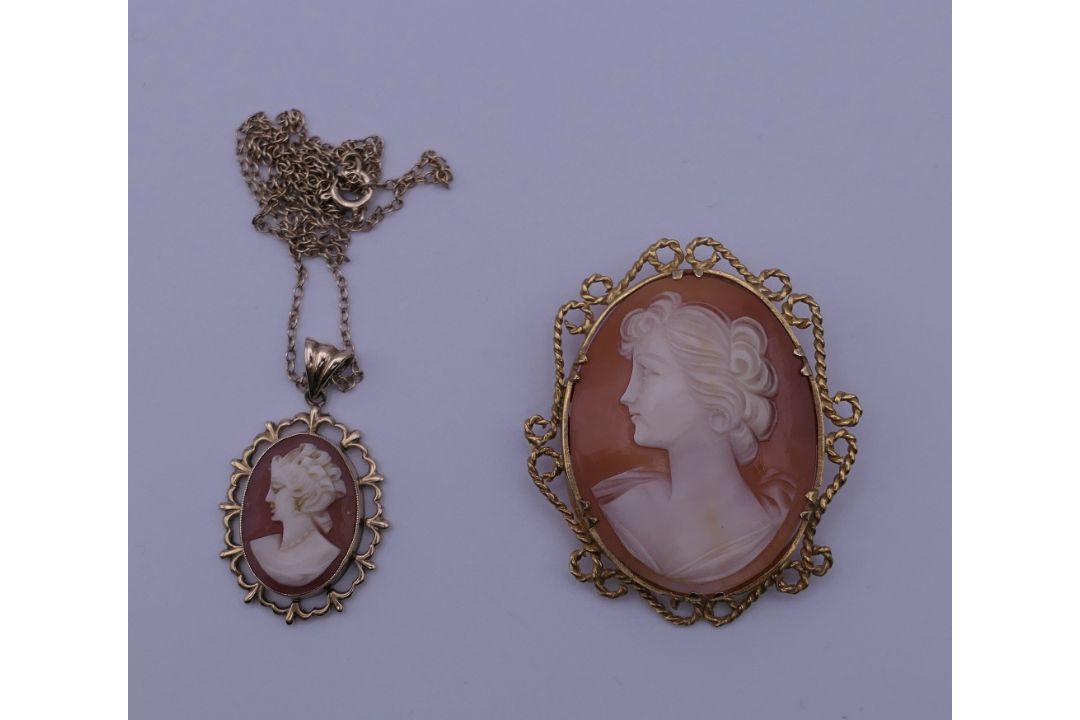 A 9 ct gold framed cameo brooch and a 9 ct gold framed cameo pendant on a 9 ct gold chain. - Image 1 of 5