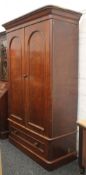 A Victorian mahogany two-door wardrobe. 210 cm high x 132 cm wide.