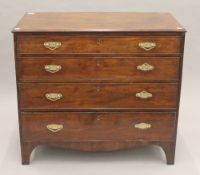 A George III mahogany chest of drawers. 91.5 cm wide.