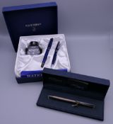 A boxed Dupont silver pen and a boxed Waterman pen set.