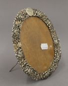 A Chinese silver photograph frame. 20 cm high.