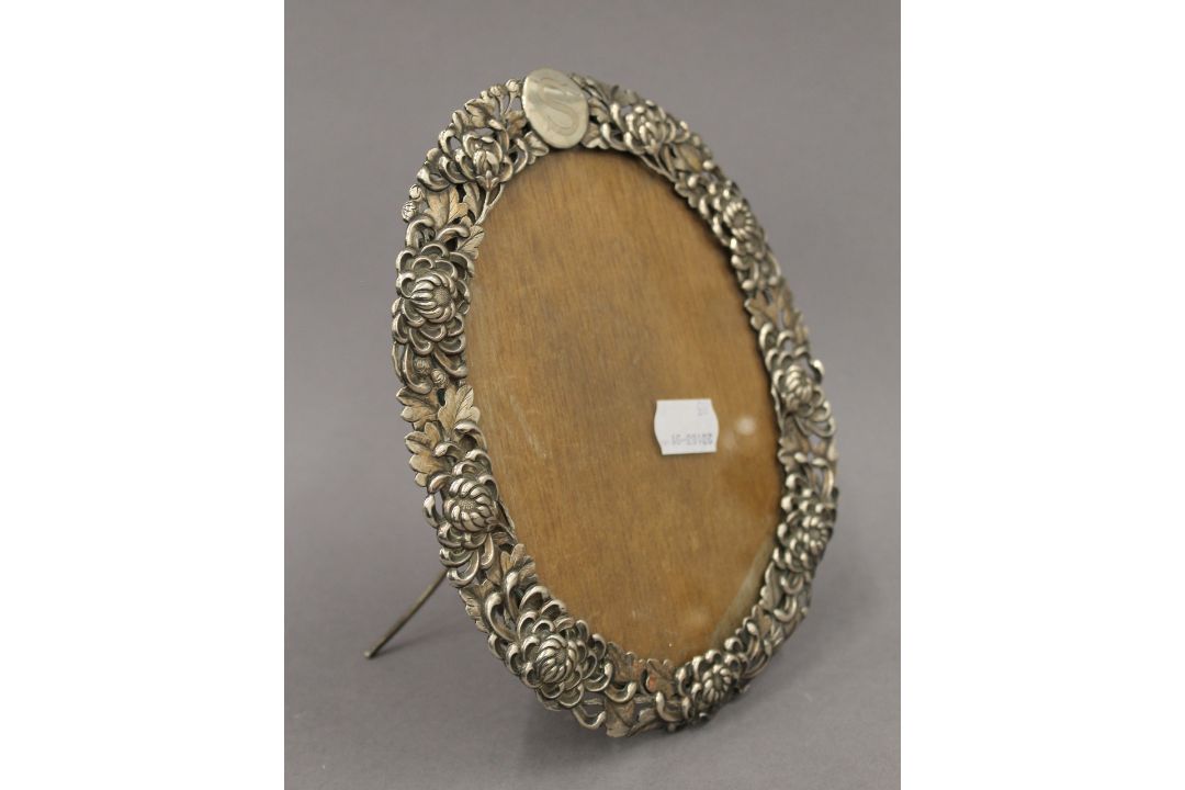 A Chinese silver photograph frame. 20 cm high. - Image 1 of 4
