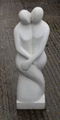 A Terrazzo garden sculpture, Balinese loving couple in white terrazzo. 80 cm high.