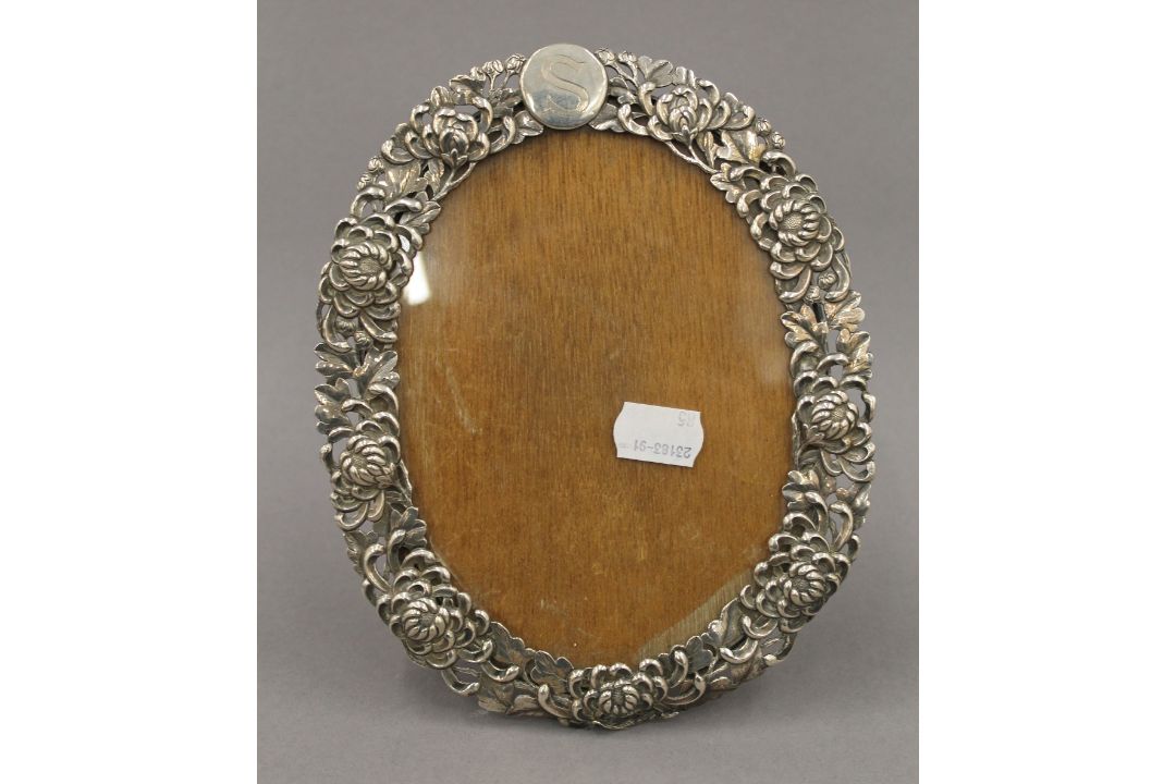 A Chinese silver photograph frame. 20 cm high. - Image 2 of 4