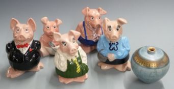 Set of five Wade NatWest pigs and a studio pottery vase, signed TL '98 and with fish cipher