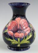 Moorcroft pedestal vase decorated in the Anemone pattern, dated 1994, H16cm