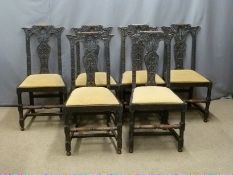 Six 19th/20thC carved oak dining chairs with upholstered drop in seats