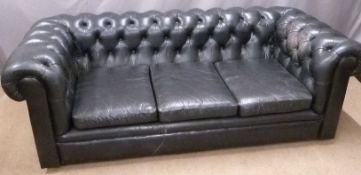 A black leather three seat Chesterfield sofa, W195cm