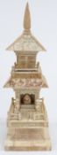 An early 20thC Eastern ivory and bone model of a shrine or temple, 34cm tall