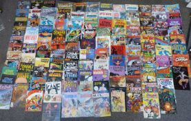 One-hundred-and-nineteen various comics including Bone, Comics Journal, The Spirit, Owly, Tomorrow