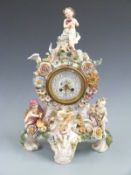 Dresden porcelain figural clock with applied flower decoration, H51cm