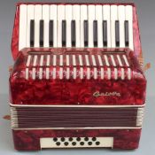 Galotta 12 bass piano accordion in red pearloid finish, with hard carry case