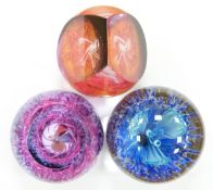 Three Caithness glass limited edition glass paperweights, White Heat 147/500 and Bewitched 237/750