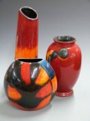 Three Poole pottery vases, tallest 34cm