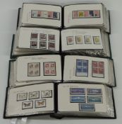 A well-presented collection of mint stamps in nine ring binders, includes GB, USA, China,