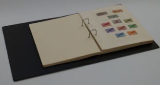 An album of North, Central and South America stamps, all periods