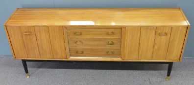 A mid century modern / retro GPlan style sideboard with folding concertina sliding doors and three