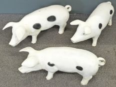 Three shop display pigs, largest 30cm